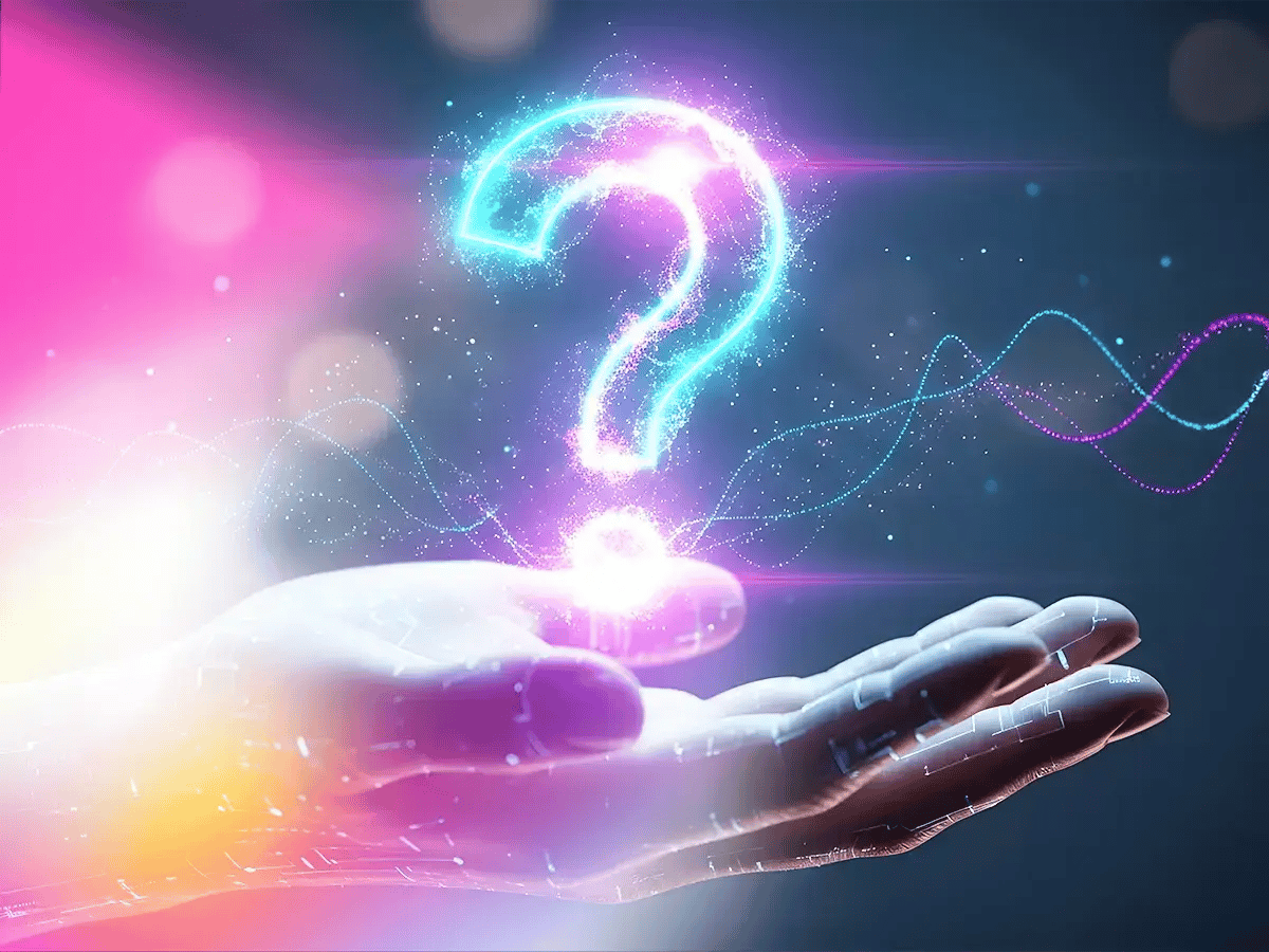 A glowing, neon question mark hovers above an open hand, set against a colorful, vibrant background