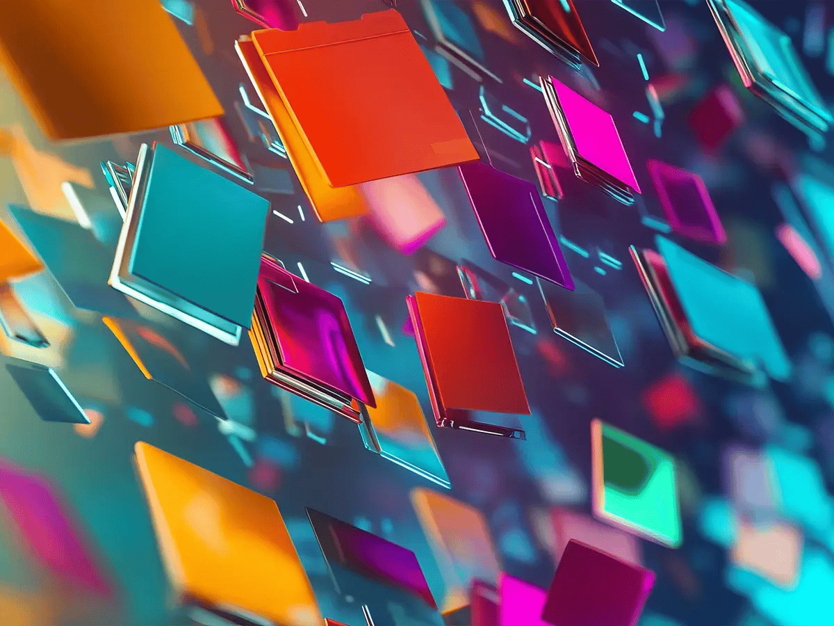 Abstract image of floating, colorful translucent squares against a blurred background
