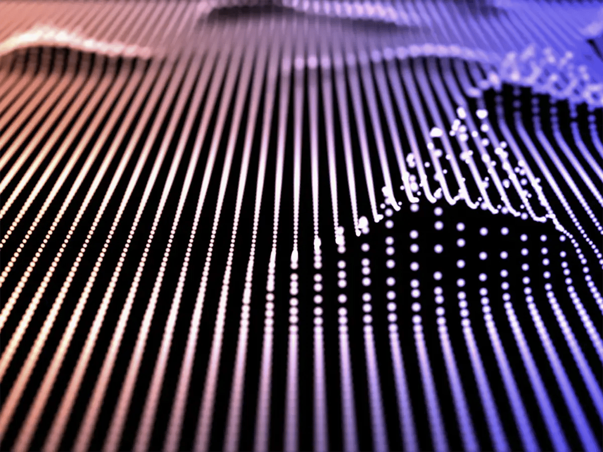 Abstract image of wavy lines and dots in gradient colors of orange and purple, creating a sense of motion and depth against a dark background