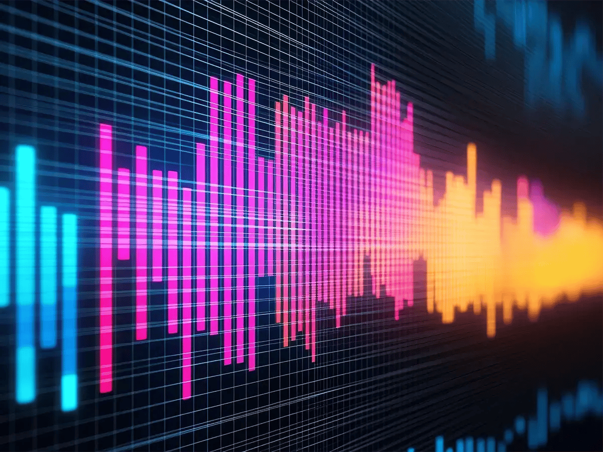 Colorful digital soundwave pattern with blue grid background, featuring vibrant pink, purple, and orange waves