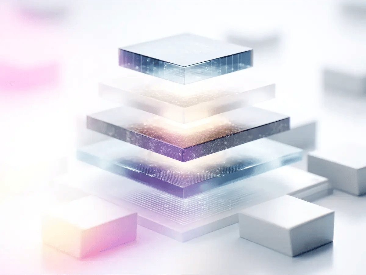 Futuristic layered glass blocks float above a bright surface, each containing glowing particles