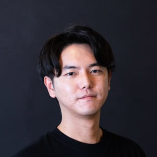 Headshot of Koichi Saito