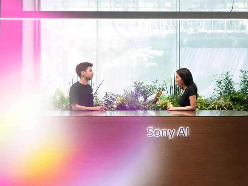 two-people-standing-at-front-lobby-of-Tokyo-office